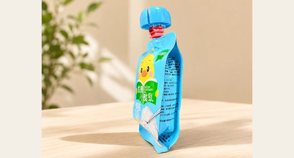 Flat spout pouch case for blue yogurt packaging